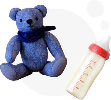 Image of teddy bear and baby bottle